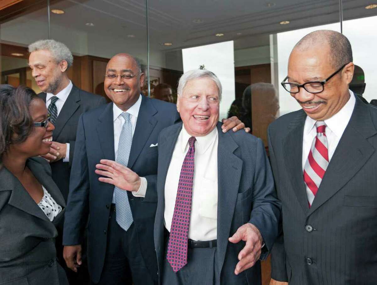 Attorney Joe Jamail, second from right, regales students and faculty from TSU with stories from a lifetime as a legendary trial attorney on April 4, 2012. Pictured, from left, are Whitney White, Dr. Dannye Holley, Dean; Senator Rodney Ellis, Joe Jamail and Dr. John M. Rudley.