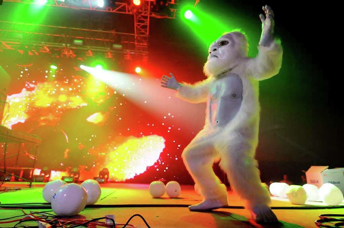 A white gorilla dances to the electronic music on stage during the Winter White Tour on Thursday, Feb. 2, 2012, at the Washington Avenue Armory in Albany, N.Y. (Cindy Schultz / Times Union)