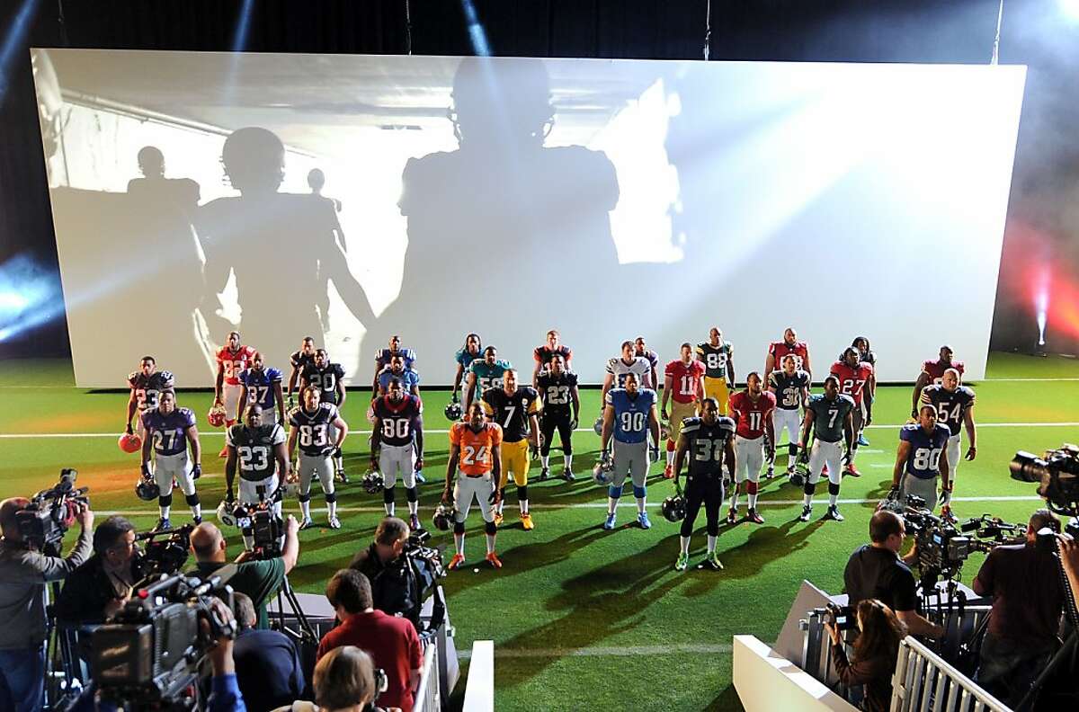 The new New York Giants uniform is displayed on a mannequin in New York,  Tuesday, April 3, 2012. NFL has unveiled its new sleek uniforms designed by  Nike. While most of the