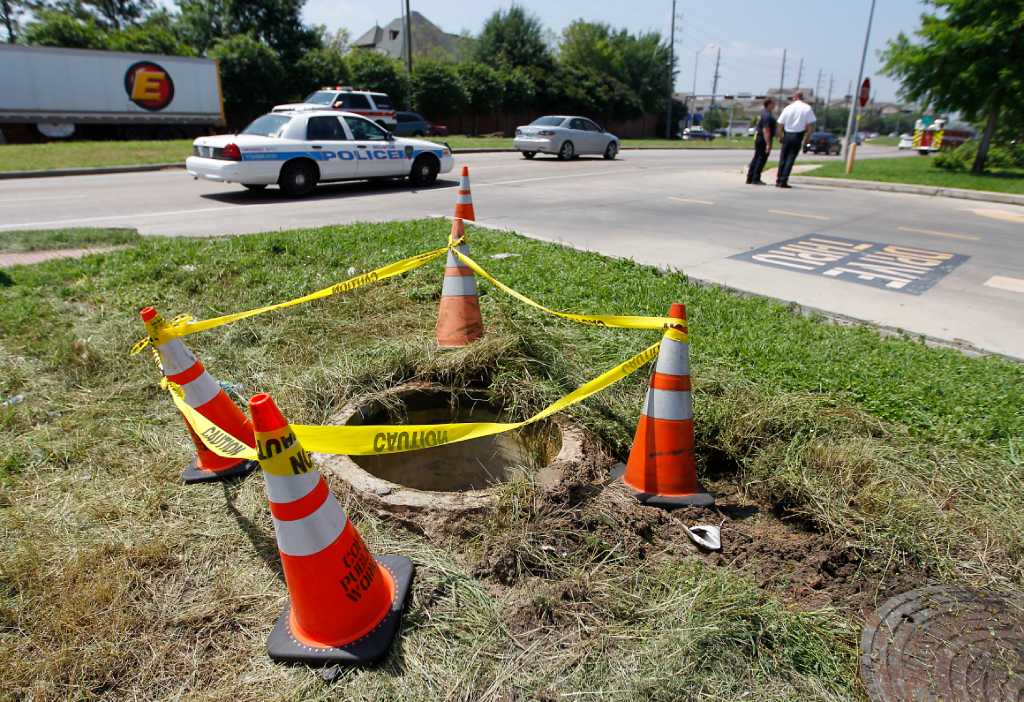 Man Rescued After Falling Into Manhole