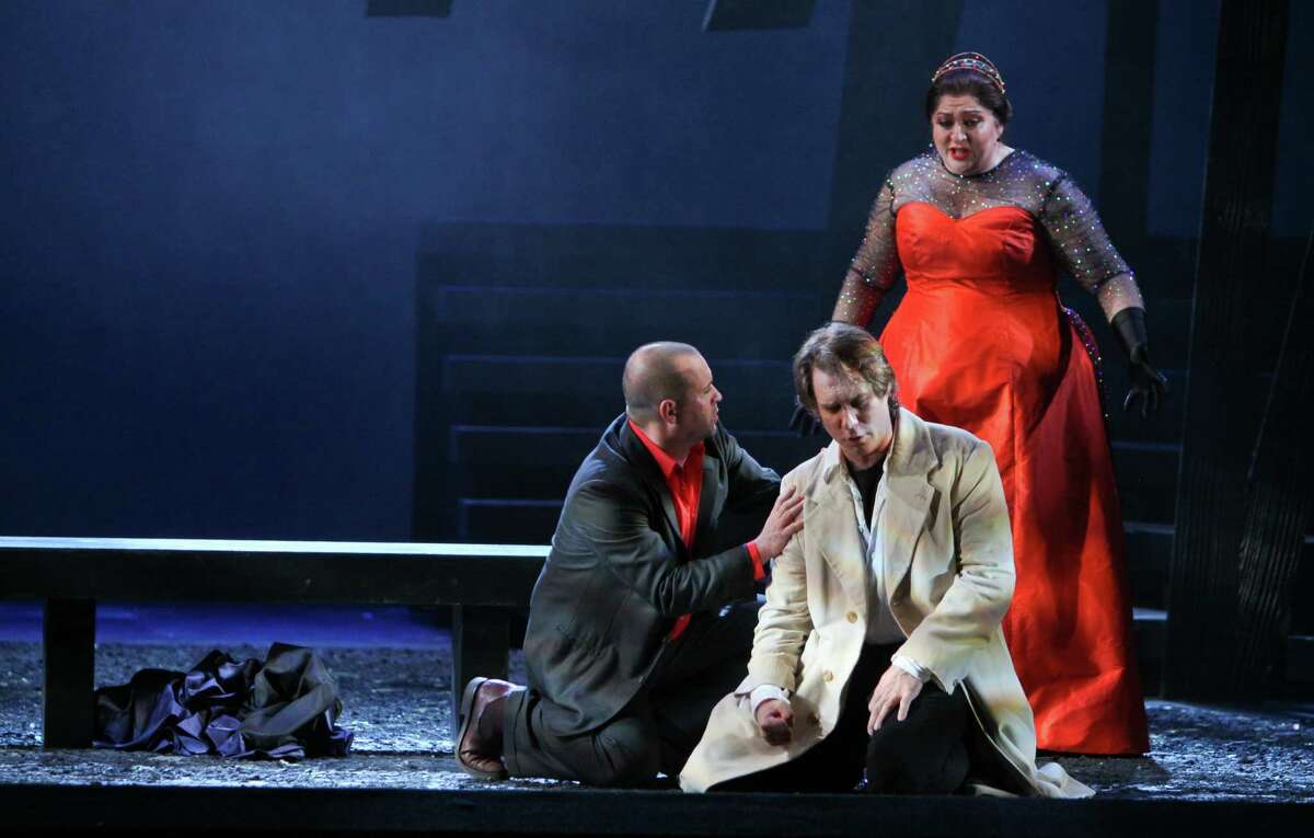 (For the Chronicle/Gary Fountain, April 2, 2012) Scott Hendricks as Rodrigue, from left, Brandon Jovanovich as Don Carlo, and Christine Goerke as Princess Eboli, in this scene from Houston Grand Opera's production of Verdi's "Don Carlos."
