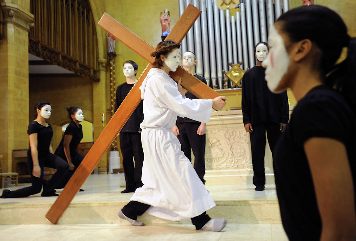Students from Blessed Sacrament School perform a living stations of the cross at Blessed Sacrament Church April 6, 2012 in Albany, N.Y. Jesus was portrayed by Quinn Lancia. (Lori Van Buren / Times Union)