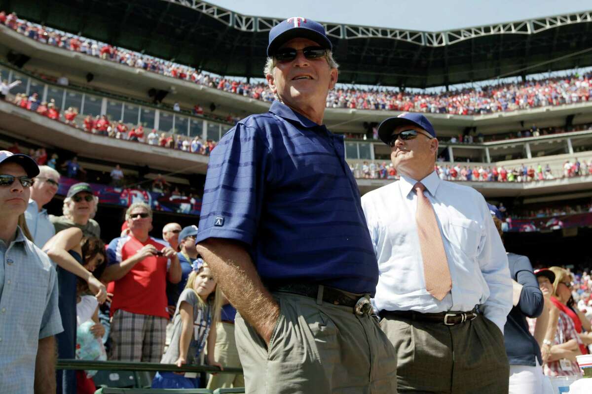 Former President George W. Bush, left, and Rangers president Nolan Ryan had plenty to take in ahead of Texas' opening-day game against the White Sox.
