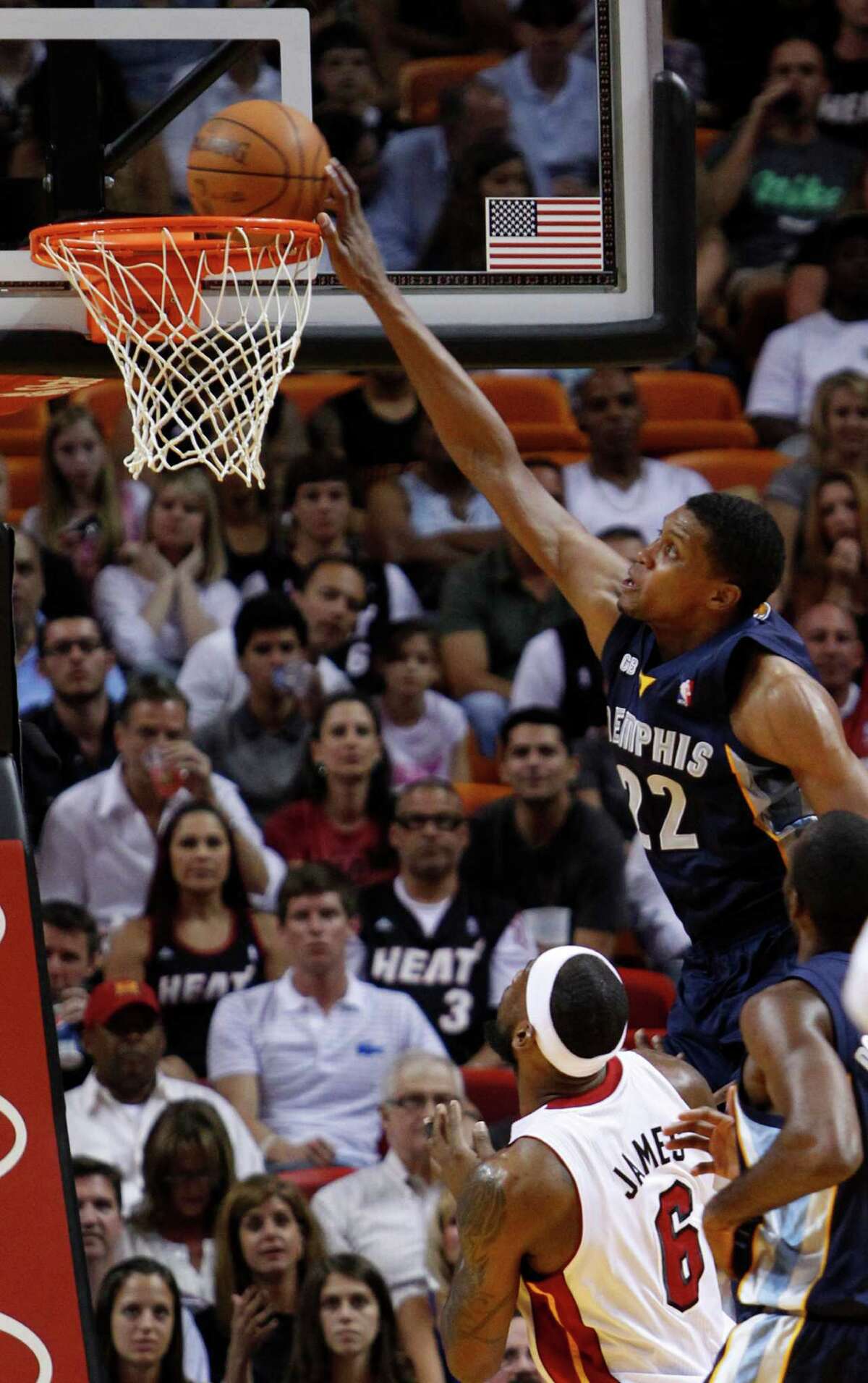 Memphis forward Rudy Gay (22) led the Grizzlies past the Heat and forward LeBron James, snapping the Heat's 17-game home win streak.