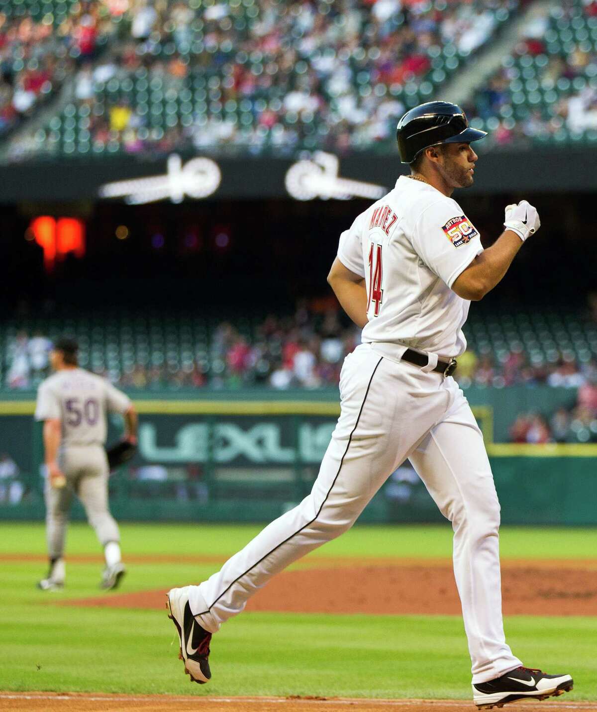 The Astros' J.D. Martinez found at least one pitch to his liking during his Saturday plate appearances against Jamie Moyer (50), homering in the fourth.
