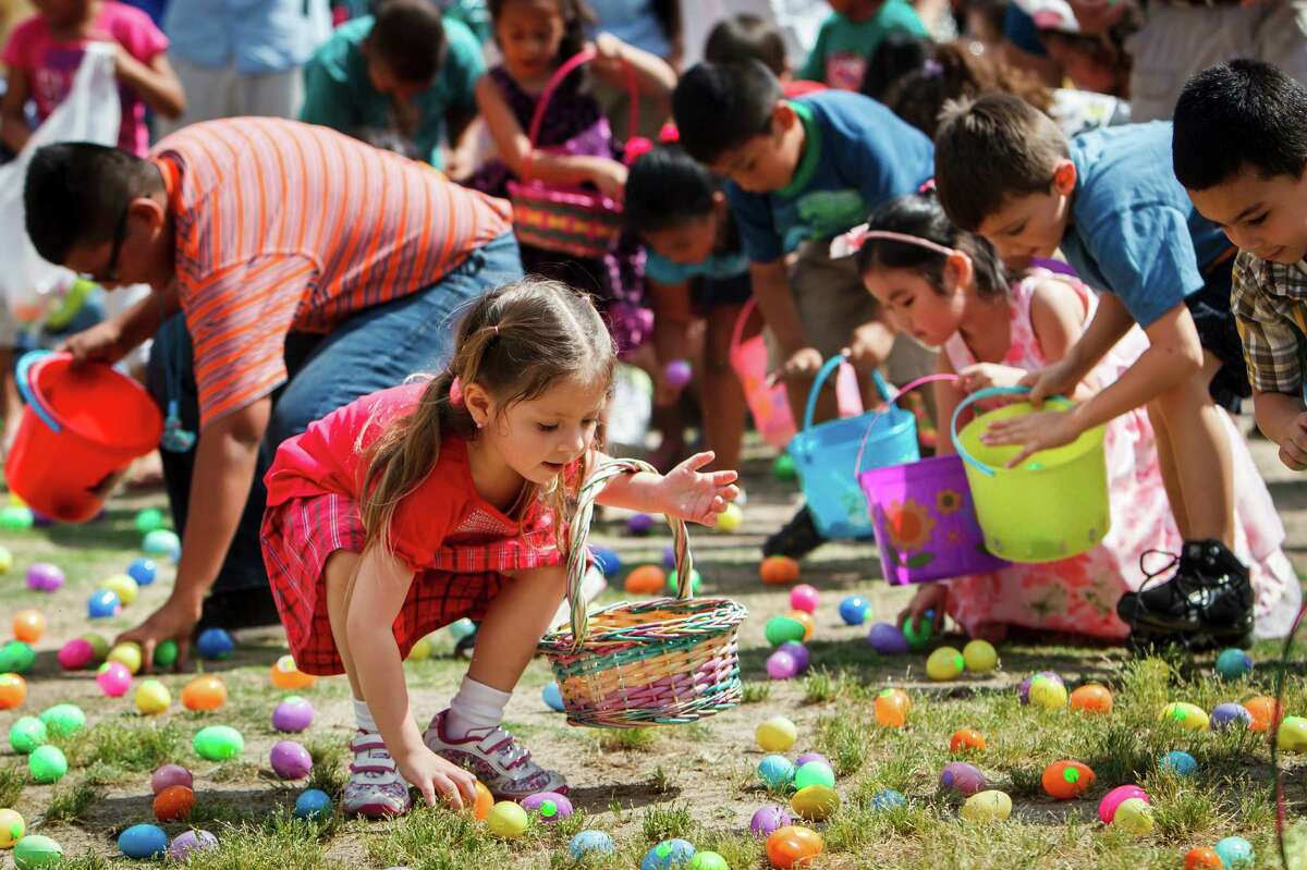 Mariana Delarosa, 6, collects eggs during the Easter egg hunt at Easter at the Park presented by St. Luke's United Methodist Church, at Discovery Green, Sunday, April 8, 2012, in Houston. The worship celebration featured a fusion of contemporary Christian and hip hop music with Faith Ayers and the Encounter Band, DJ Psycho, and the Youth Advocates Break Dancers. The celebration continued with open circle break dancing and fun children's crafts and activities including, of course, an Easter egg hunt.