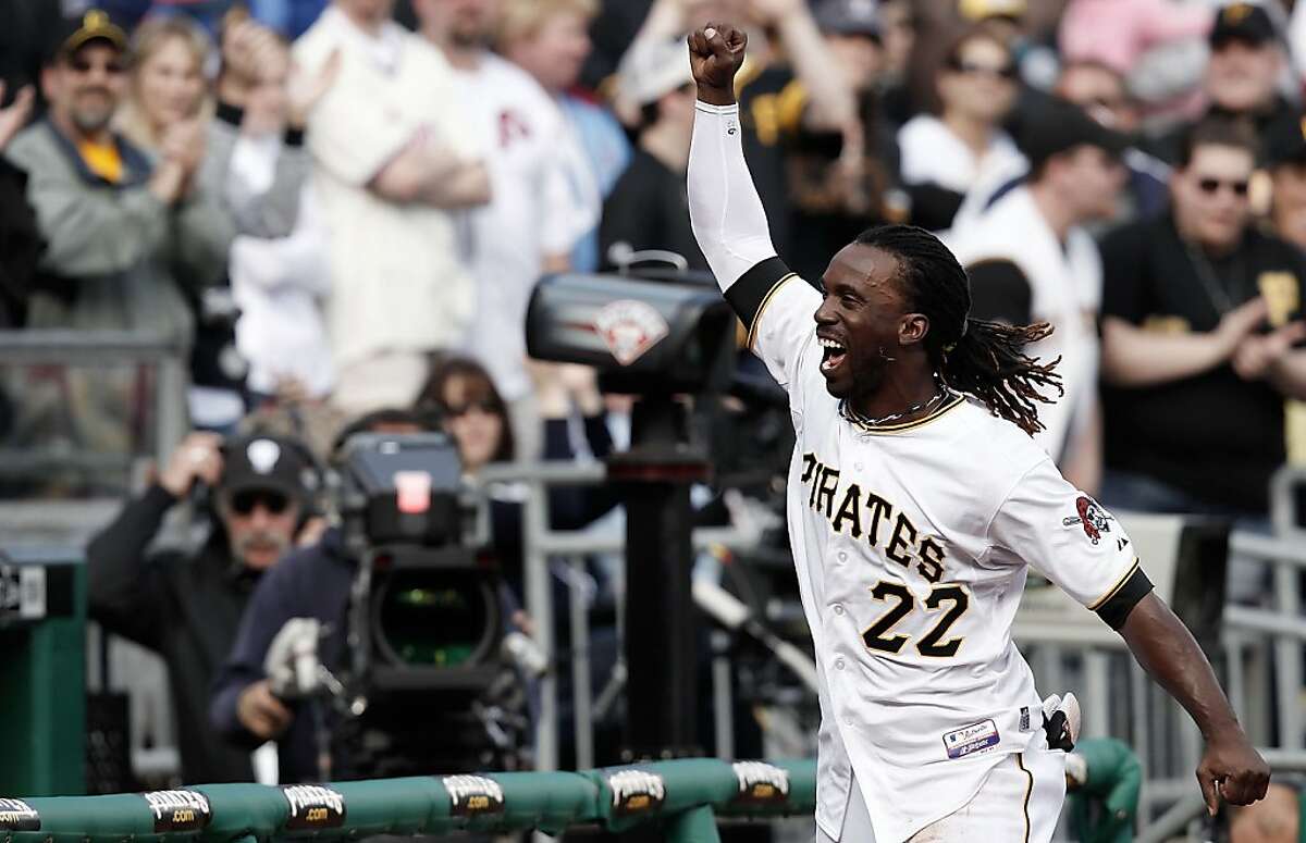 Pittsburgh Pirates center fielder Andrew McCutchen hits a RBI single  News Photo - Getty Images