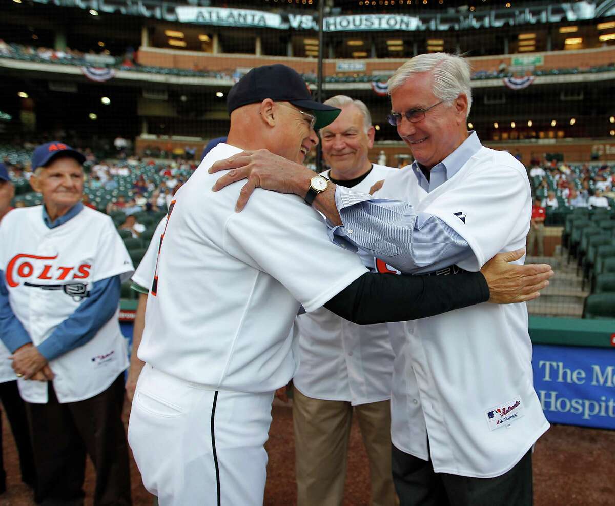 Houston Astros manager Brad Mills (2) greets former player Bob Aspromonte before the start of an MLB game at at Minute Maid Park on Tuesday, April 10, 2012, in Houston, 50th anniversary of the first game in Houston franchise history on April 10, 1962, the Houston Colt .45s defeated the Chicago Cubs, 11-2, at Colt Stadium.