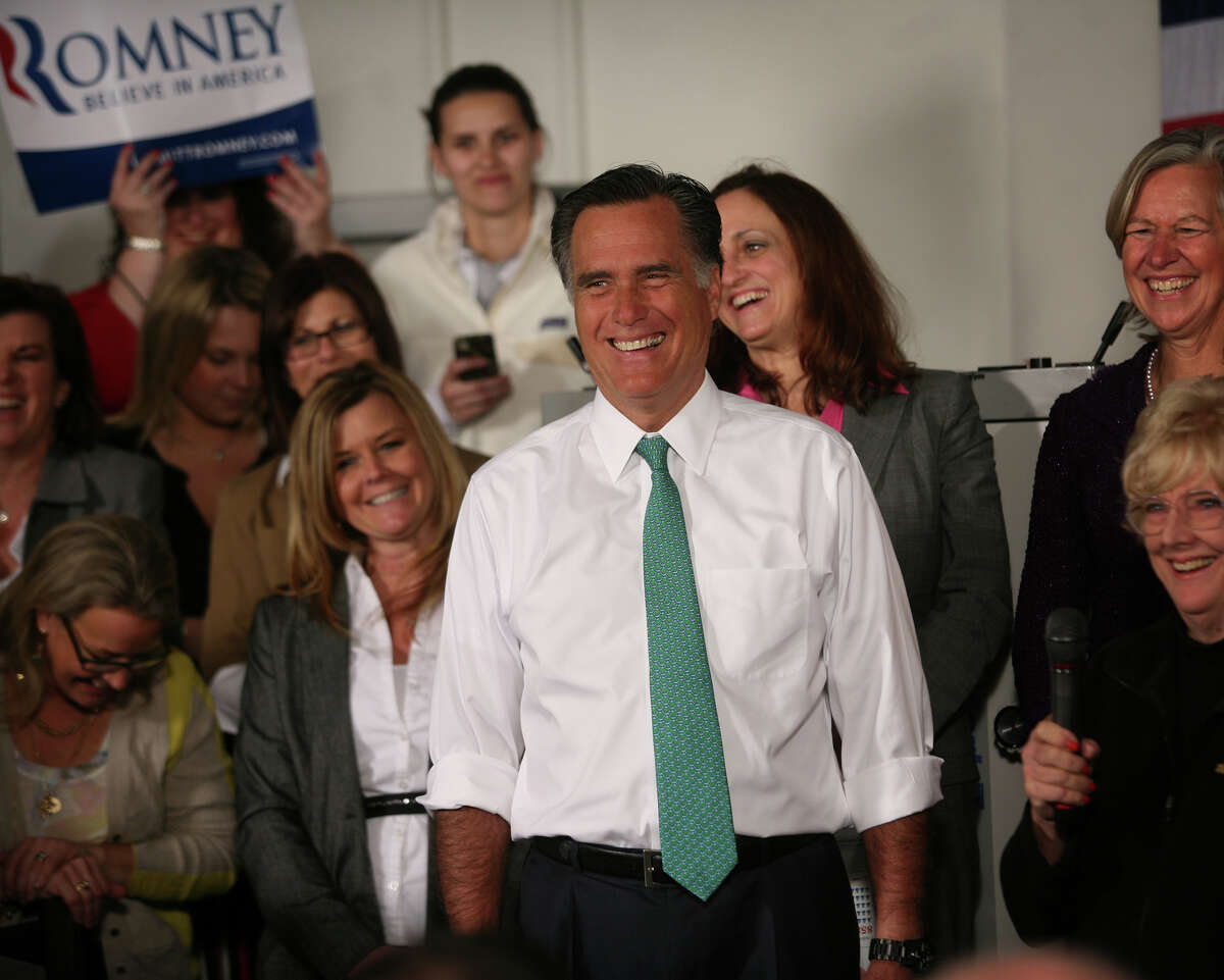 Republican presidential candidate Mitt Romney smiles as he is introduced during a campaign stop at AlphaGraphics at 915 Main Street in downtown Hartford on Wednesday, April 11, 2012.