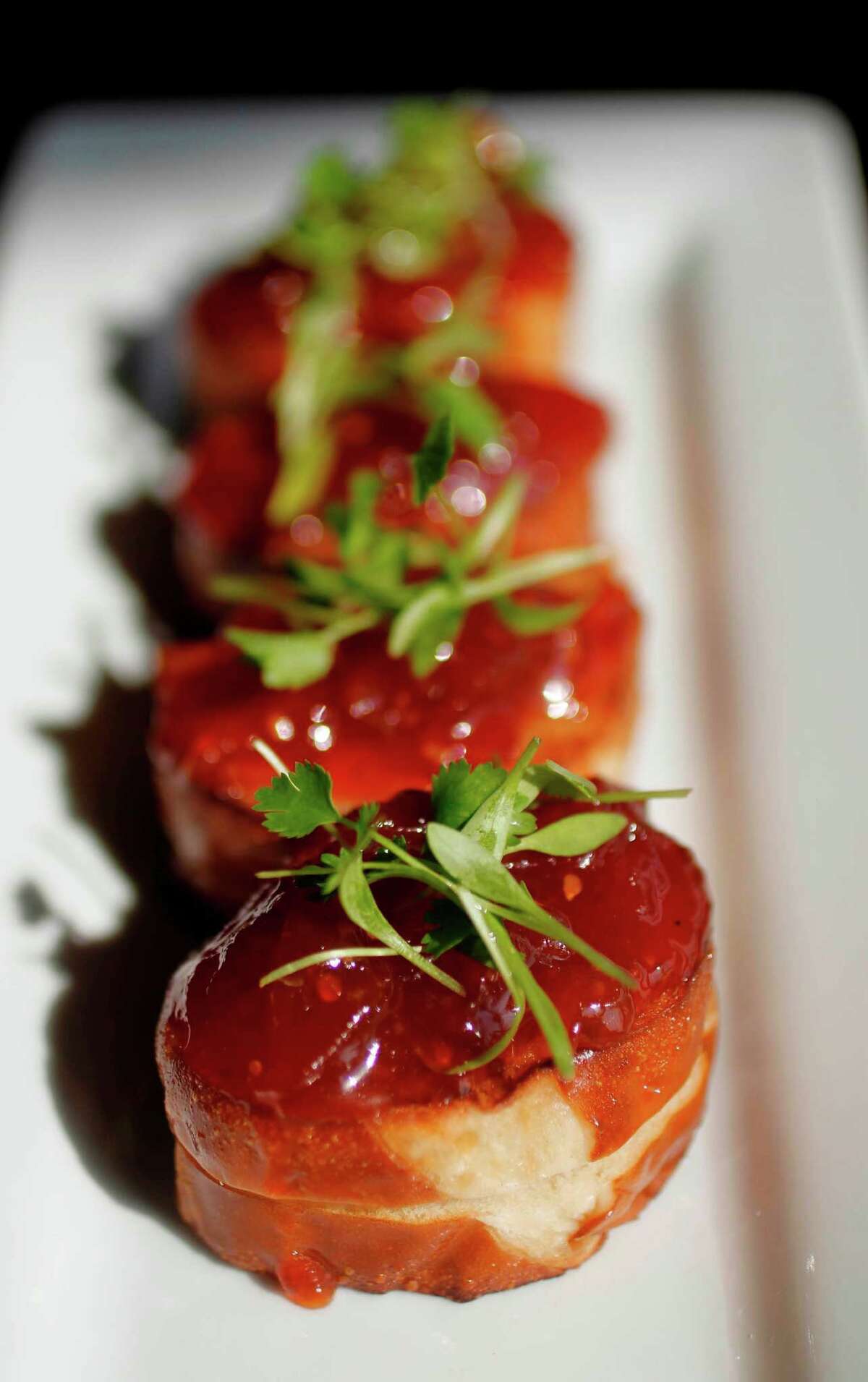 Grilled Cheese Sandwiches are mini chevre grilled cheese sandwiches topped with sweet tomato jam. , are favorites at the tasting room. on Lake Houston on Wednesday, April 4, 2012, in Kingwood. ( Mayra Beltran / Houston Chronicle )