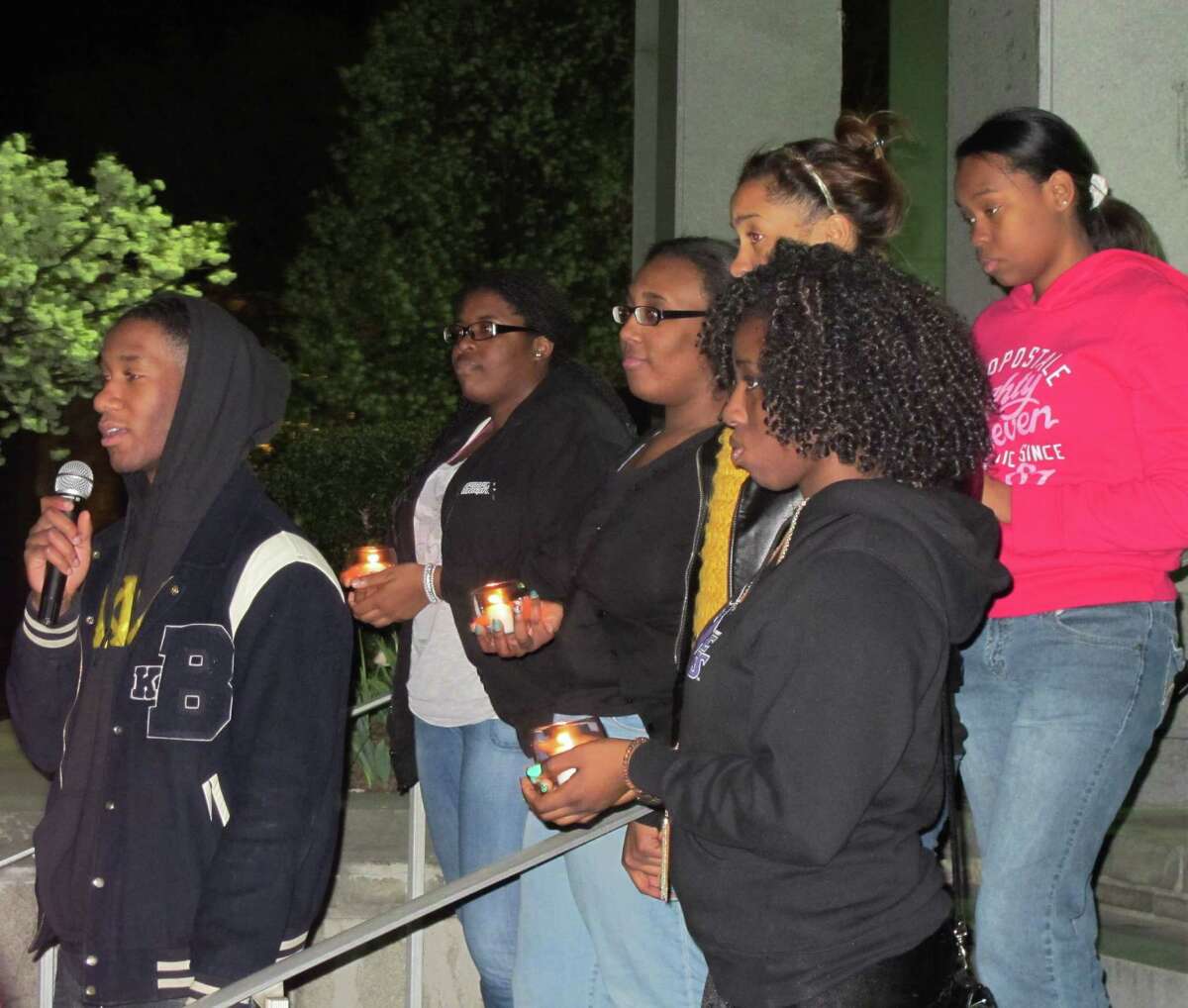 Chris Soufron, of the Alpha Phi Alpha fraternity at the University of Bridgeport, speaks at a rally for justice in the Trayvon Martin case on Wednesday, April 11, 2012.