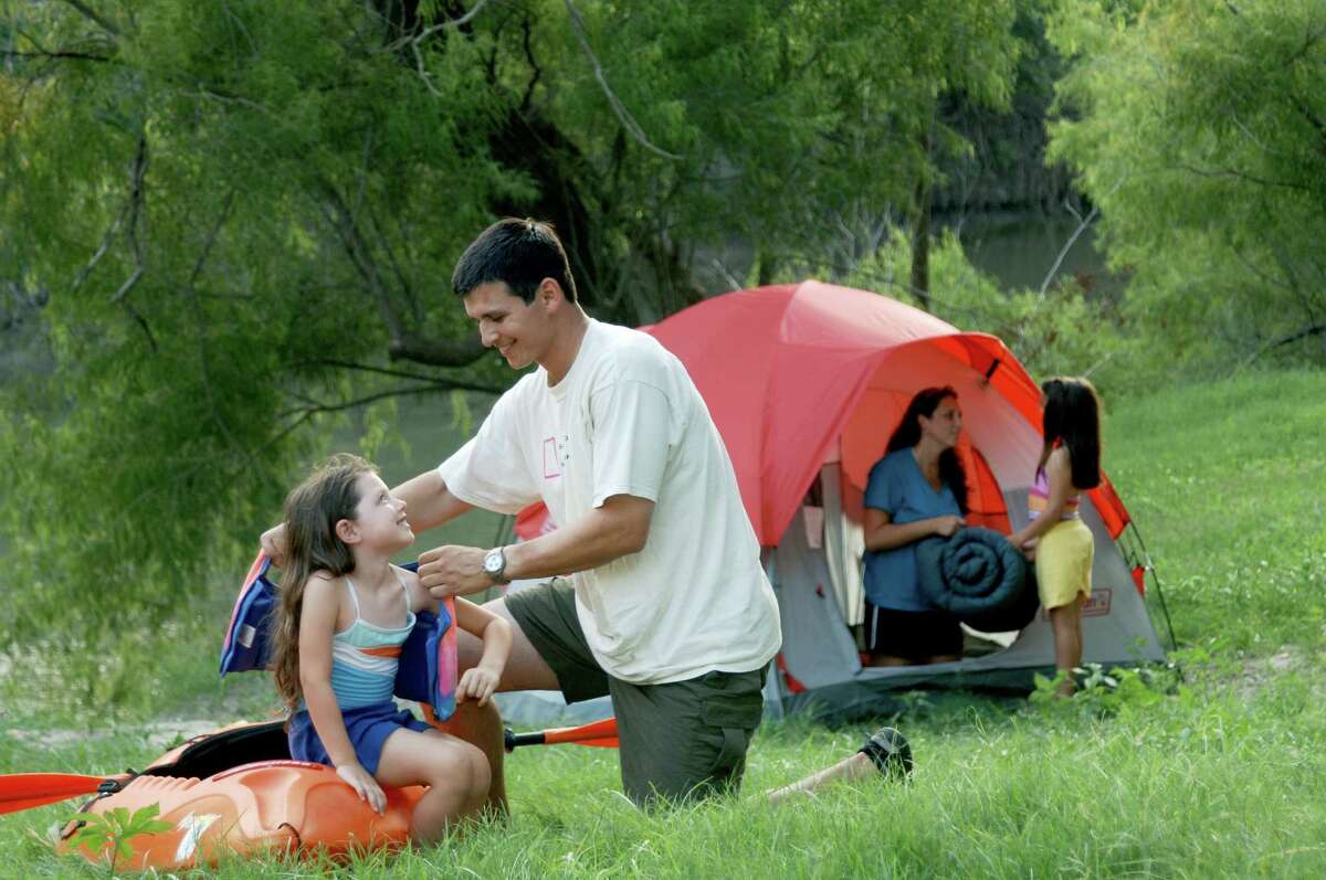 A family gets the campsite set up and the kids ready at Goliad State Park during a Texas Outdoor Family workshop.