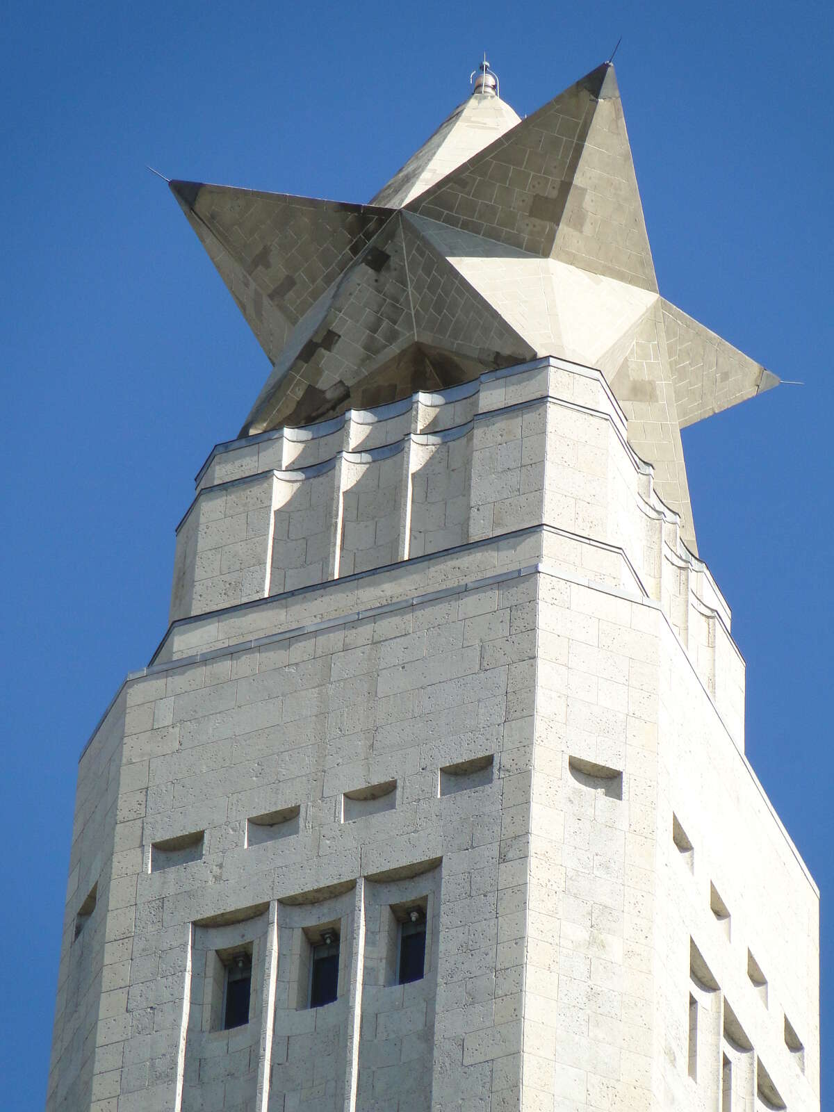 The strange nine-pointed star atop the San Jacinto monument -- designed so that, from most angles, it looks like the five-pointed Lone Star of Texas -- is roughly 34 feet tall. Made of steel, concrete and cordova limestone, it's estimated to weigh 220 tons. credit: Tracy Hobson Lehmann