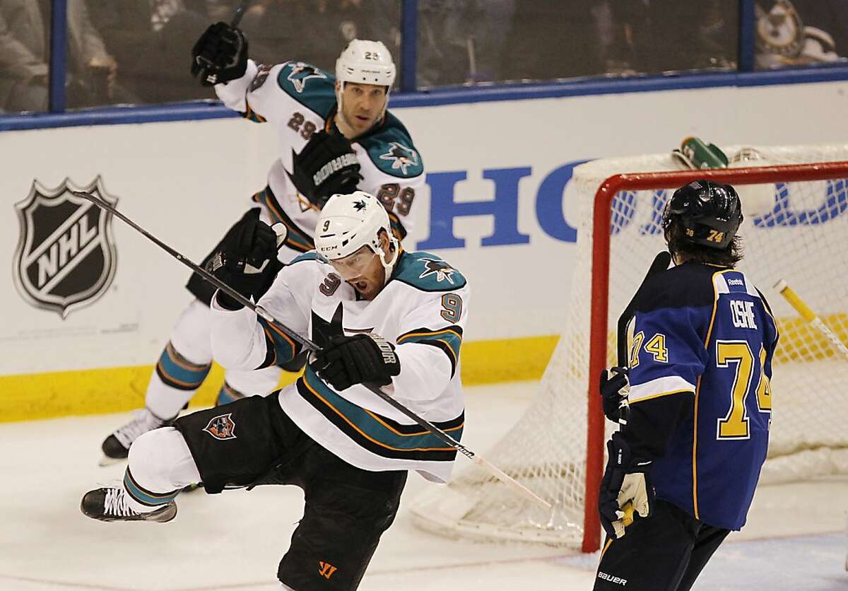 The San Jose Sharks' Martin Havlat (9) scores in the first period against the St. Louis Blues and T.J. Oshie, right, at the Scottrade Center in St. Louis, Missouri, on Thursday, April 12, 2012. San Jose won in double overtime, 3-2. (Zia Nizami/Belleville News-Democrat/MCT)