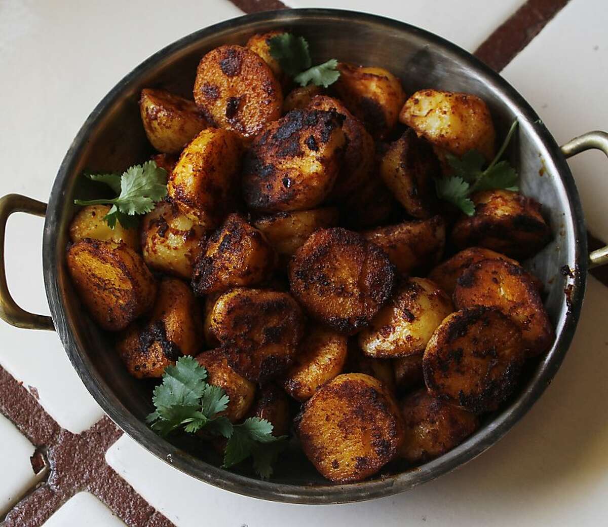 Spicy Potatoes from Jacqueline Higuera McMahan for the South to North column, 4/15/2012