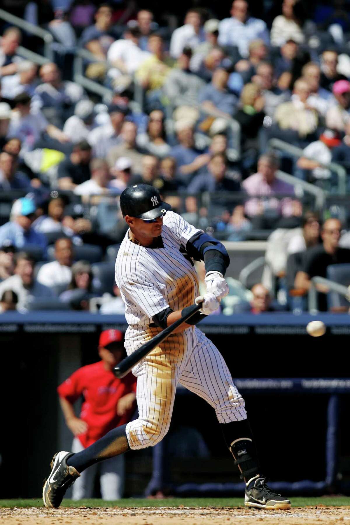 New York Yankees Alex Rodriguez hits a solo home run against the