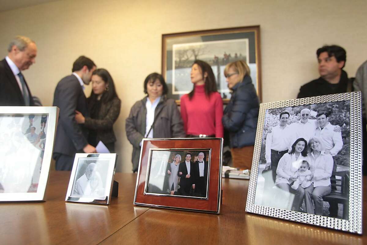 Family photographs are displayed after a news conference about the Feb. 18 murder of Peter Cukor on Friday, April 13, 2012, in Oakland, Calif. Peter Cukor was killed 15 minutes after making a 911 call for police help in Berkeley, Calif.