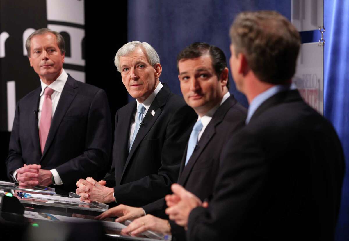 Republican candidates for U.S. Senate, left to right, Lt. Governor David Dewhurst, Tom Leppert and Ted Cruz listen to a response from Craig James during the Belo Debate Friday night, April 13, 2012 at the WFAA studios in Dallas, Texas. The four are vying for the seat of retiring Sen. Kay Bailey Hutchison.