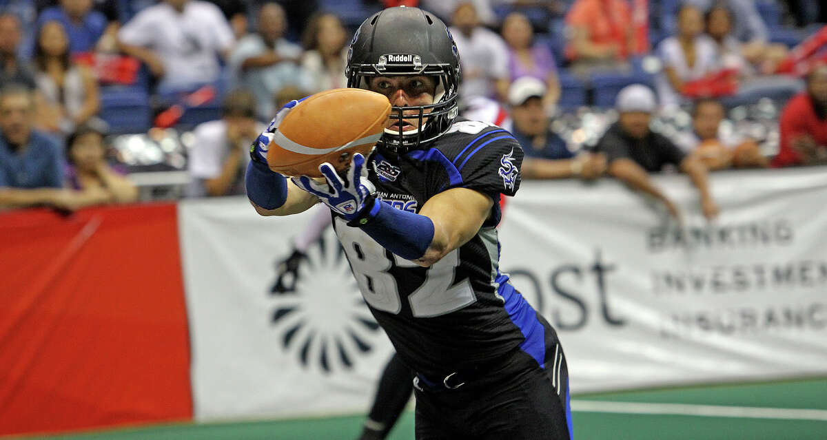 Talons receiver Robert Quiroga hauls in a touchdown pass late in the fourth quarter as the San antonio Talons host the New Orleans Voodoo at the Alamodome on April 13, 2012. Tom Reel/ San Antoniopress-News