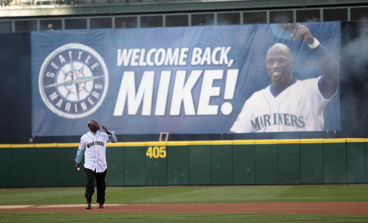 Moose, the Seattle Mariners' mascot, greets George The Moose Man King  outside Safeco Field prior to the Mariners' home opener MLB baseball game  against the Oakland Athletics, Friday, April 13, 2012, in