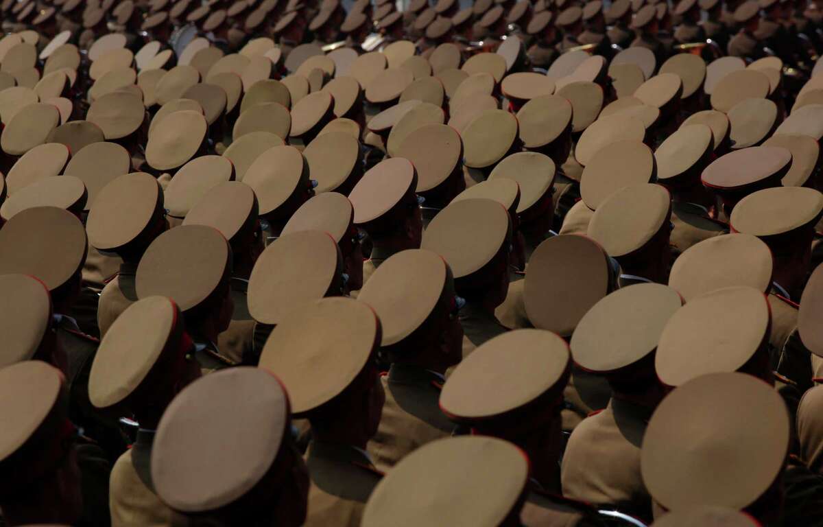 North Korean military members attend a mass meeting of North Korea's ruling party at a stadium in Pyongyang on Saturday April 14, 2012. North Korea will mark the 100-year birth anniversary of the late leader Kim Il Sung on Sunday April 15.