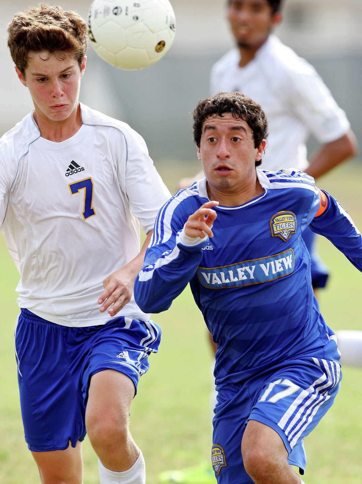 Alamo Heights' Mitch Katona and Pharr Valley View's Noe Moncada chase after the ball during second half action of their Region IV-4A final held April 14, 2012 at Cabaniss Field in Corpus Christi, Tx.