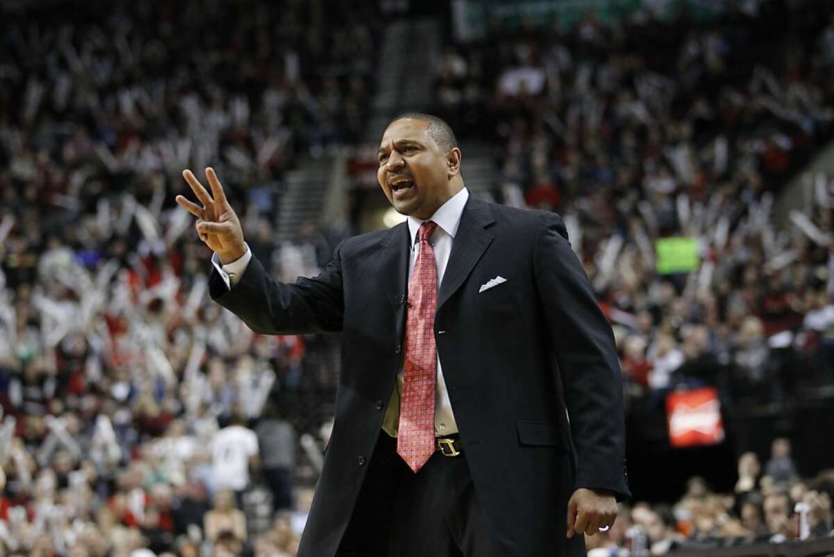 Golden State Warriors head coach Mark Jackson shouts to his team in the second half during an NBA basketball game with the Portland Trail Blazers Wednesday, April 11, 2012, in Portland, Ore. (AP Photo/Rick Bowmer)