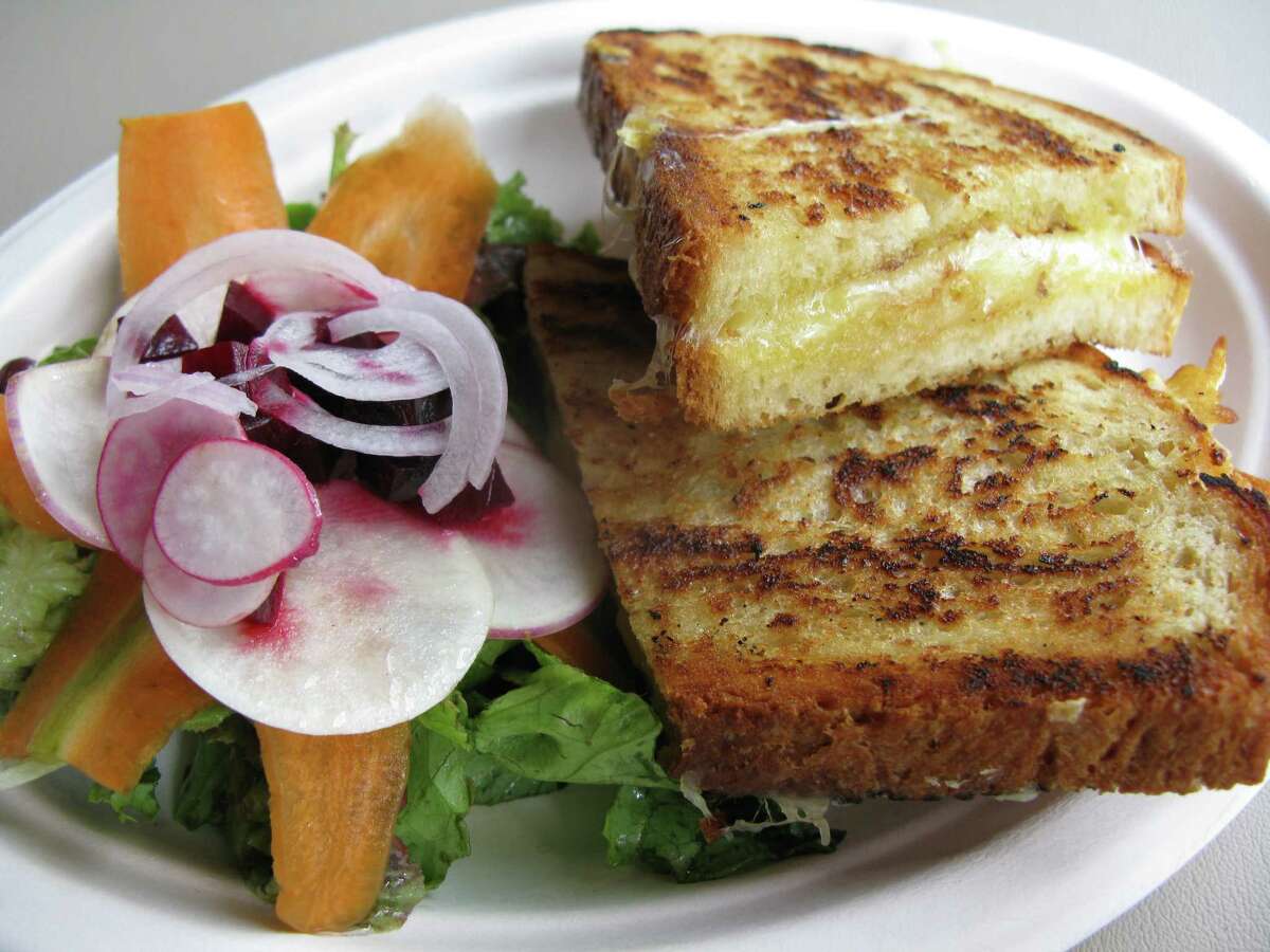 Grilled cheese sandwich and salad from Restaurant Gwendolyn's new lunch menu.