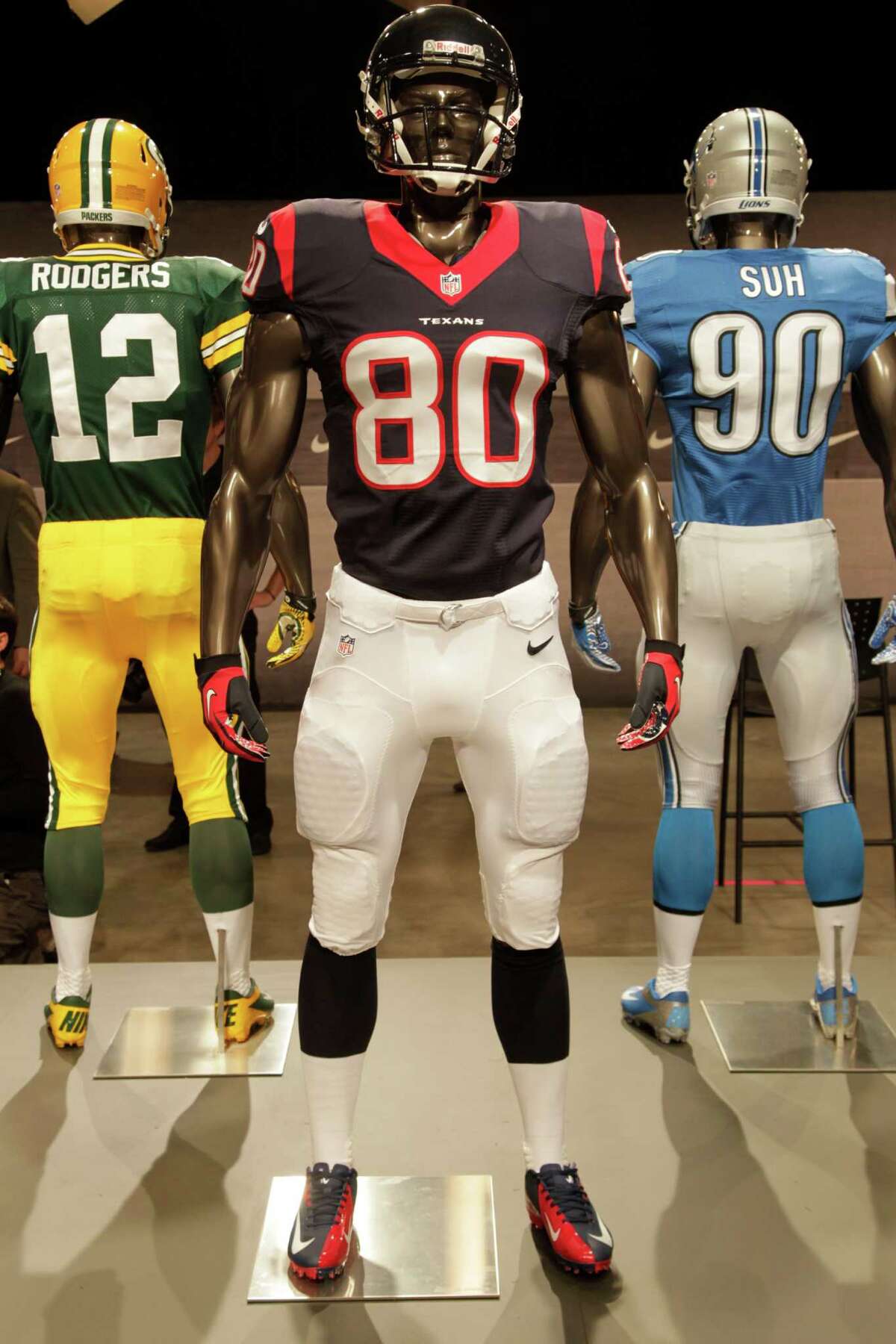The new Houston Texans uniform is displayed on a mannequin in New York City on April 3. While it is not very different visually, it is made with new technology that makes it lighter, dryer and more comfortable.