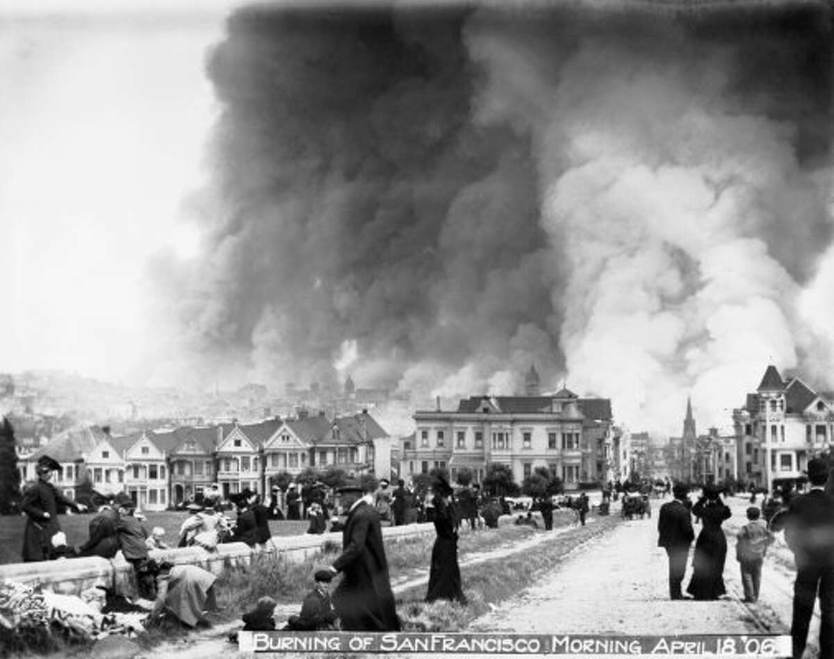 More than 1,000 people were killed in the April 18th 1906 earthquake and ensuing fires.  Here people watch the city burn from Alamo Square, Hayes Street & Pierce Street,.April 18, 1906 (SFMTA)