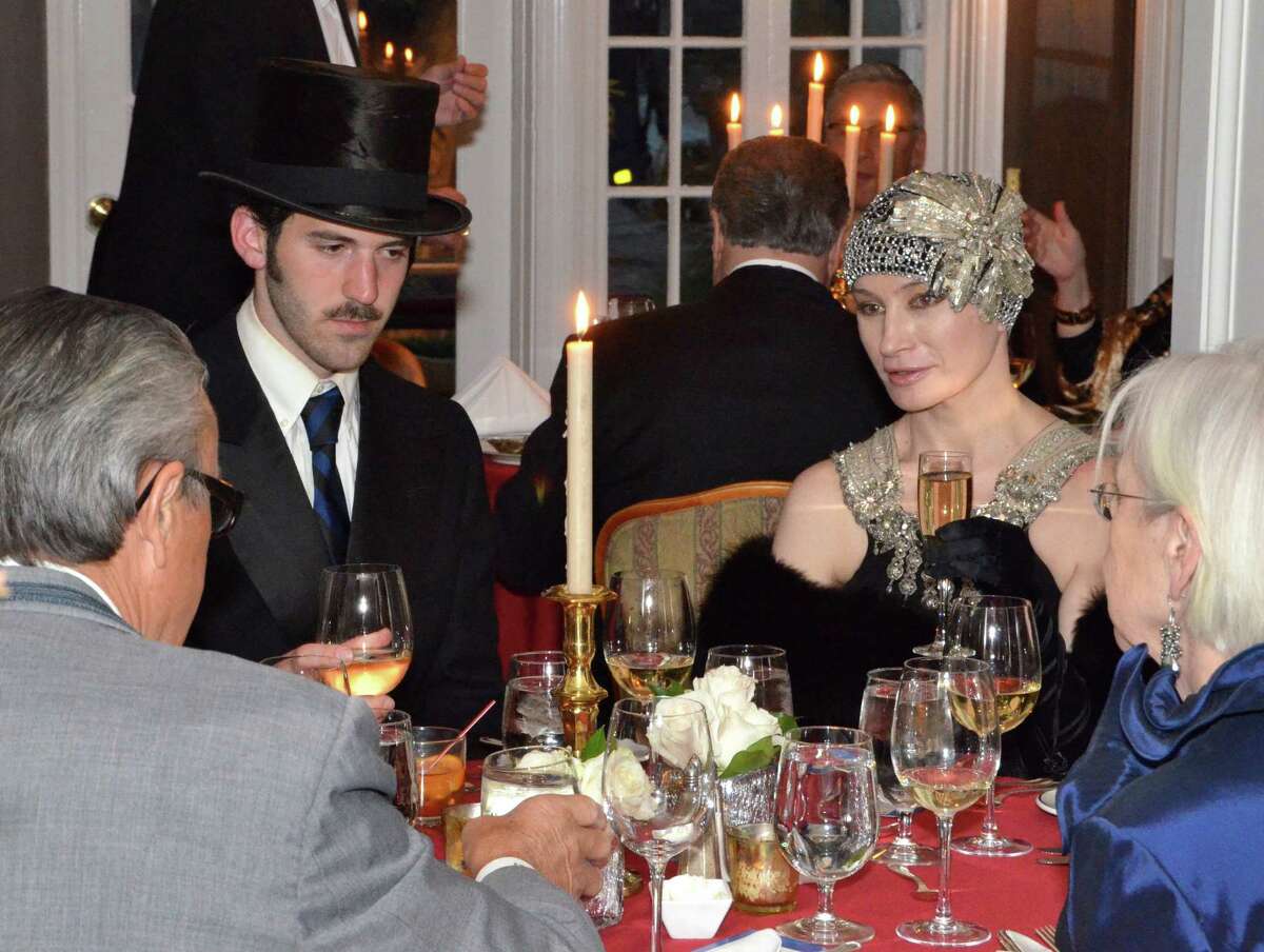 Christopher Arnet and Tatiana Laing dine at the 100 year anniversary of the Titanic, held at the Roger Sherman Inn.