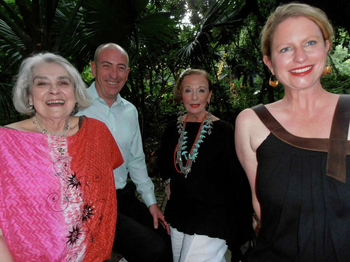 Sherry Kafka Wagner, from left, Irby Hightower, Claire Golden and Elizabeth Fauerso confer at a party promoting the expansion of the Santa Fe International Folk Art Market to San Antonio next year.