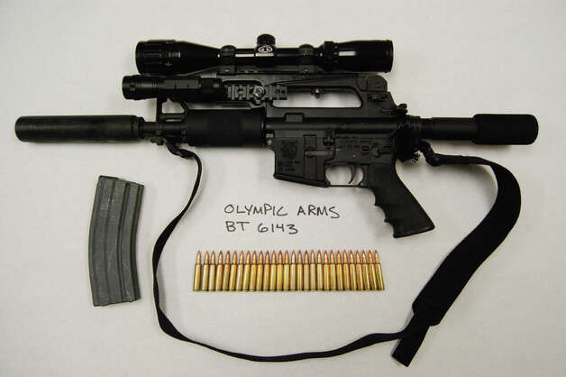 ar 15 rifle with silencer and scope