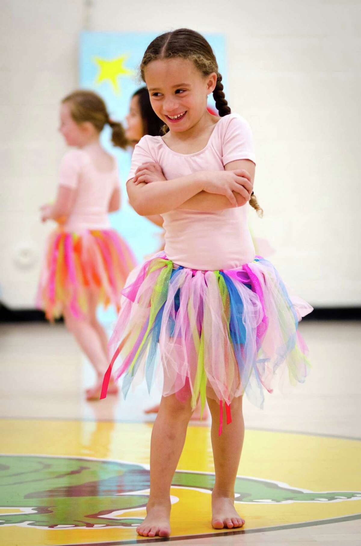 Ruby Montanez smiles happily during "Dance Around."