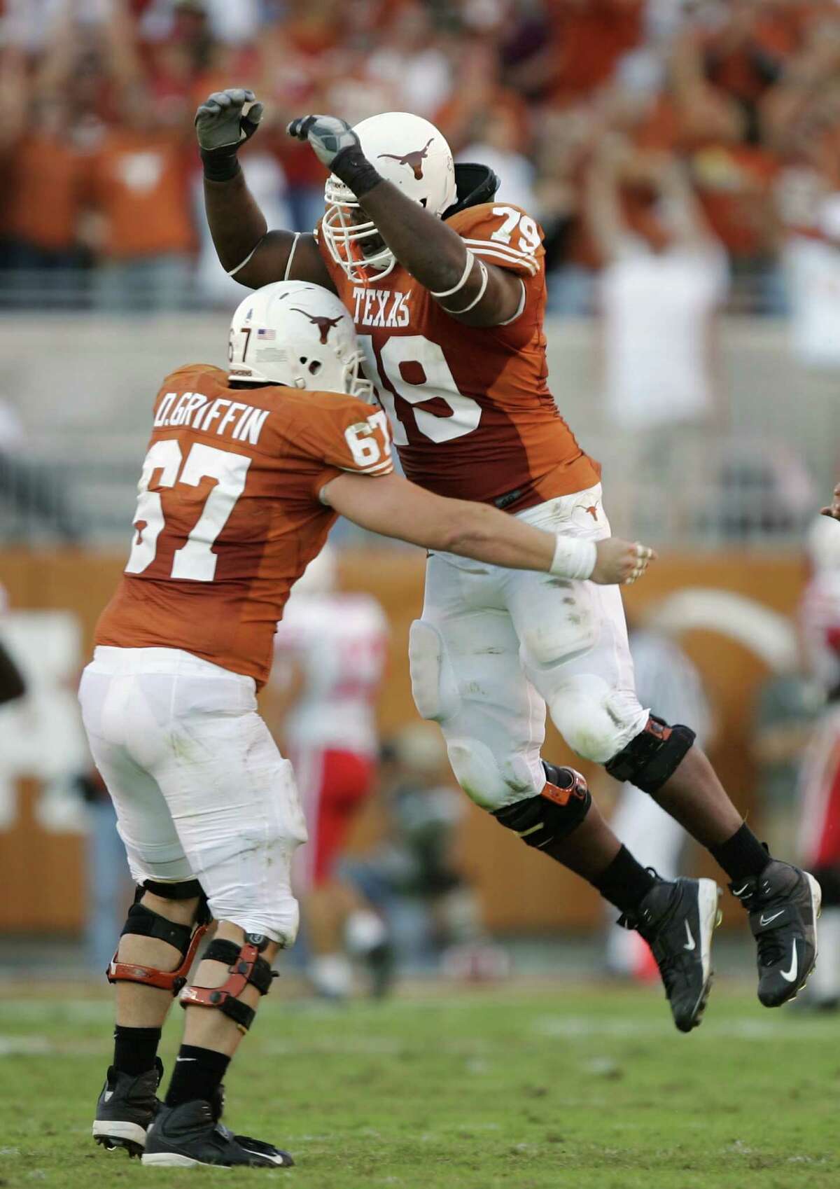Dallas Griffin, left, tipped the scales at 285 pounds during his playing days at UT but is down to 180.