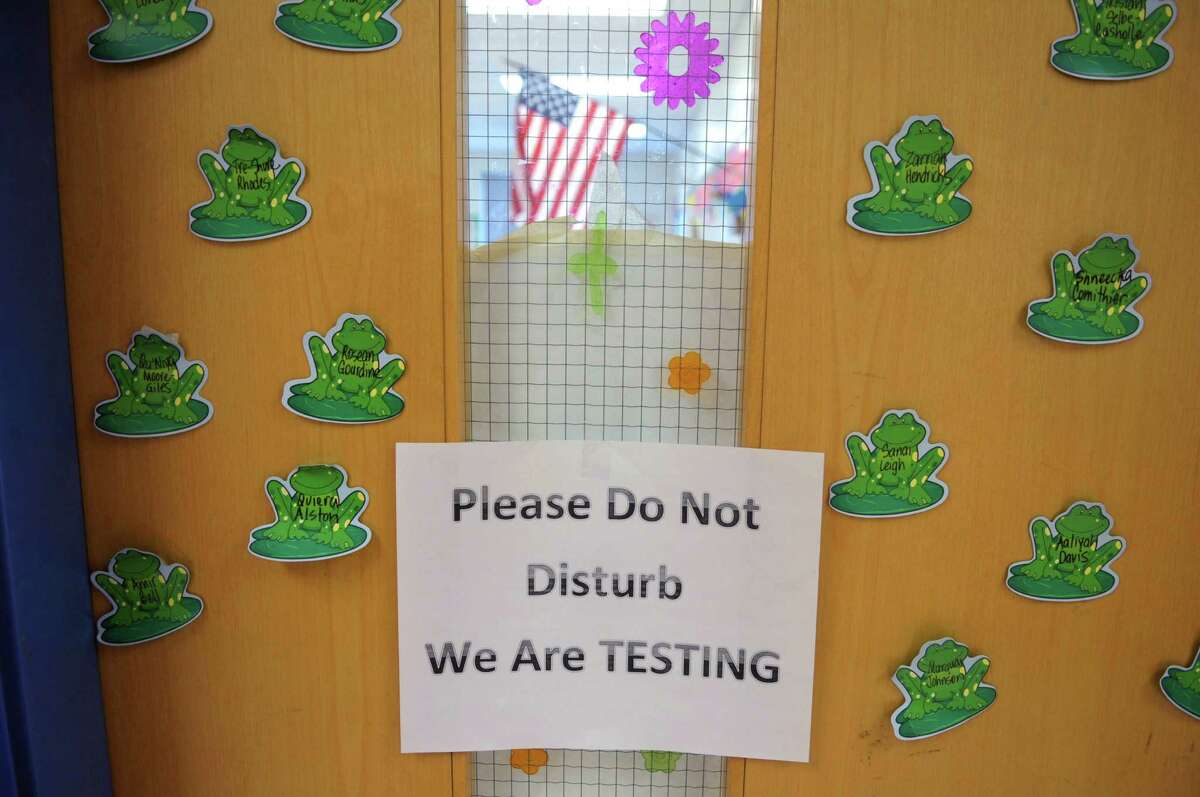 A sign on the door of a third grade class as students in grades 3 through 8 take the state standardized tests at Sheridan Prep Academy on Wednesday, April 18, 2012 in Albany, NY. (Paul Buckowski / Times Union)