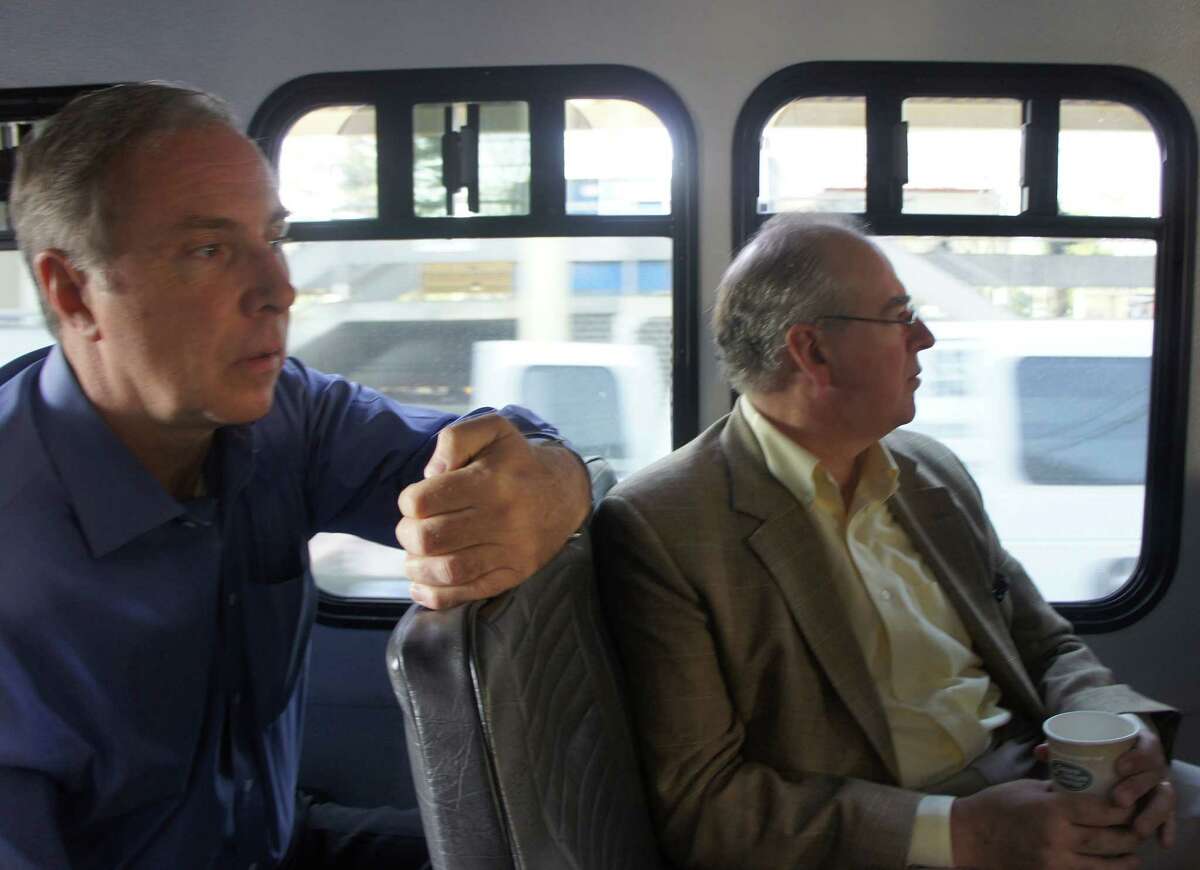Jim Ross, right, and Carl Lindahl sit on board the S4 shuttle, as it arrives at the Saugatuck Metro-North train station on Tuesday, April 17, 2012.