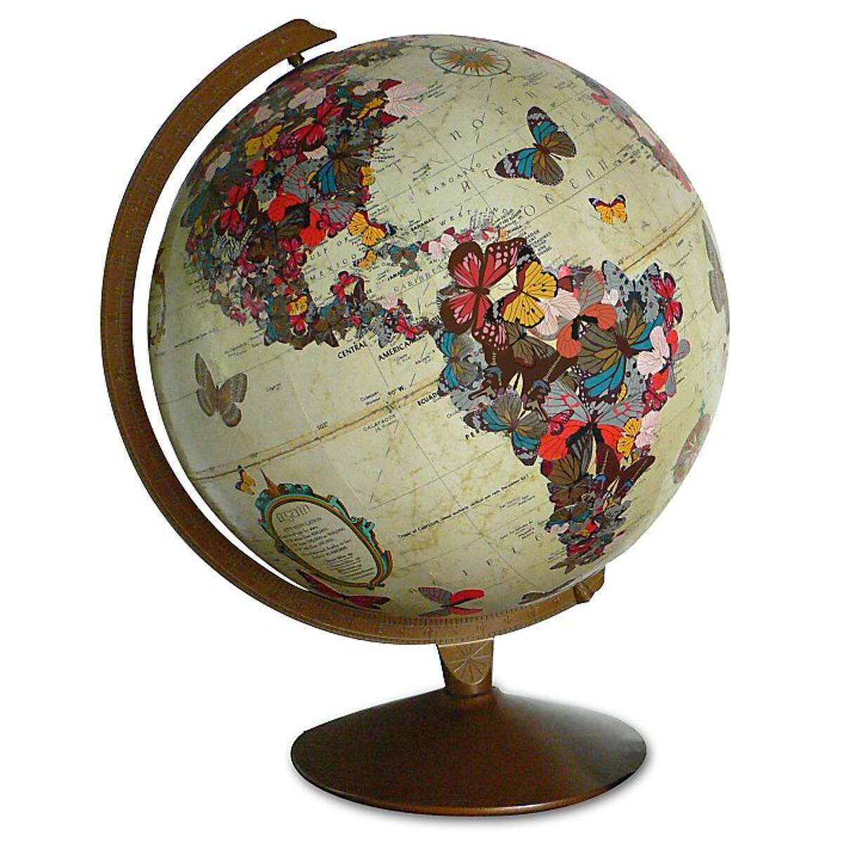 Wendy Gold creates both custom globes and a line of 19 basic designs with her line ImagineNations. She decoupages old globes with photos, hand-cut artwork and lettering to create unique and beautiful keepsakes. This is the Flutter By.