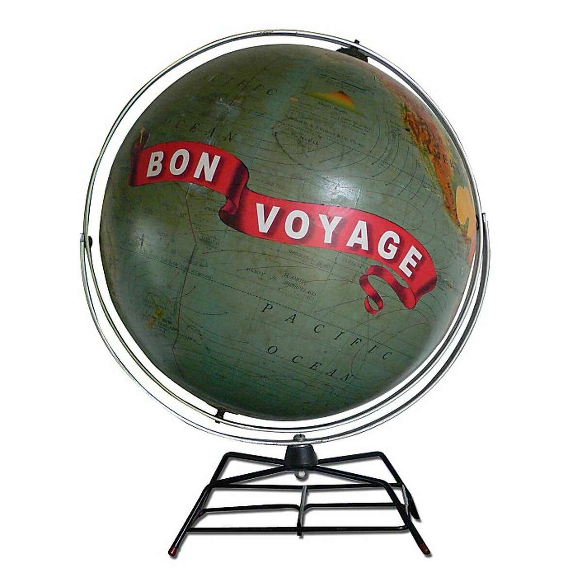 Wendy Gold creates both custom globes and a line of 19 basic designs with her line ImagineNations. She decoupages old globes with photos, hand-cut artwork and lettering to create unique and beautiful keepsakes. This is the Bon Voyage.