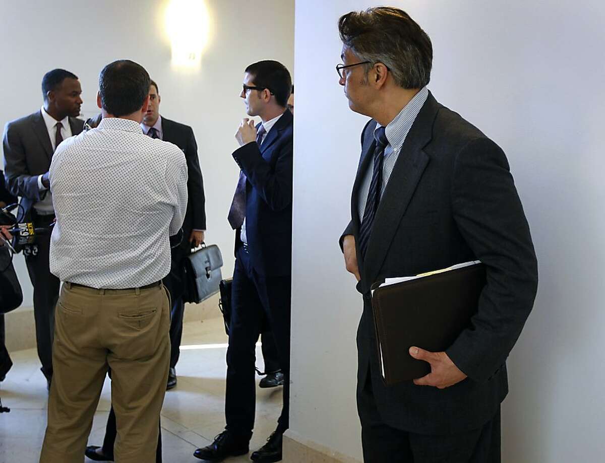Ross Mirkarimi waits for his attorneys to speak with reporters after Judge Harold E. Kahn denied their request to remove City Attorney Dennis Herrera's office from the misconduct case against Mirkarimi, citing an alleged conflict of interest, at the Civic Center Courthouse in San Francisco, Calif. on Thursday, April 19, 2012.