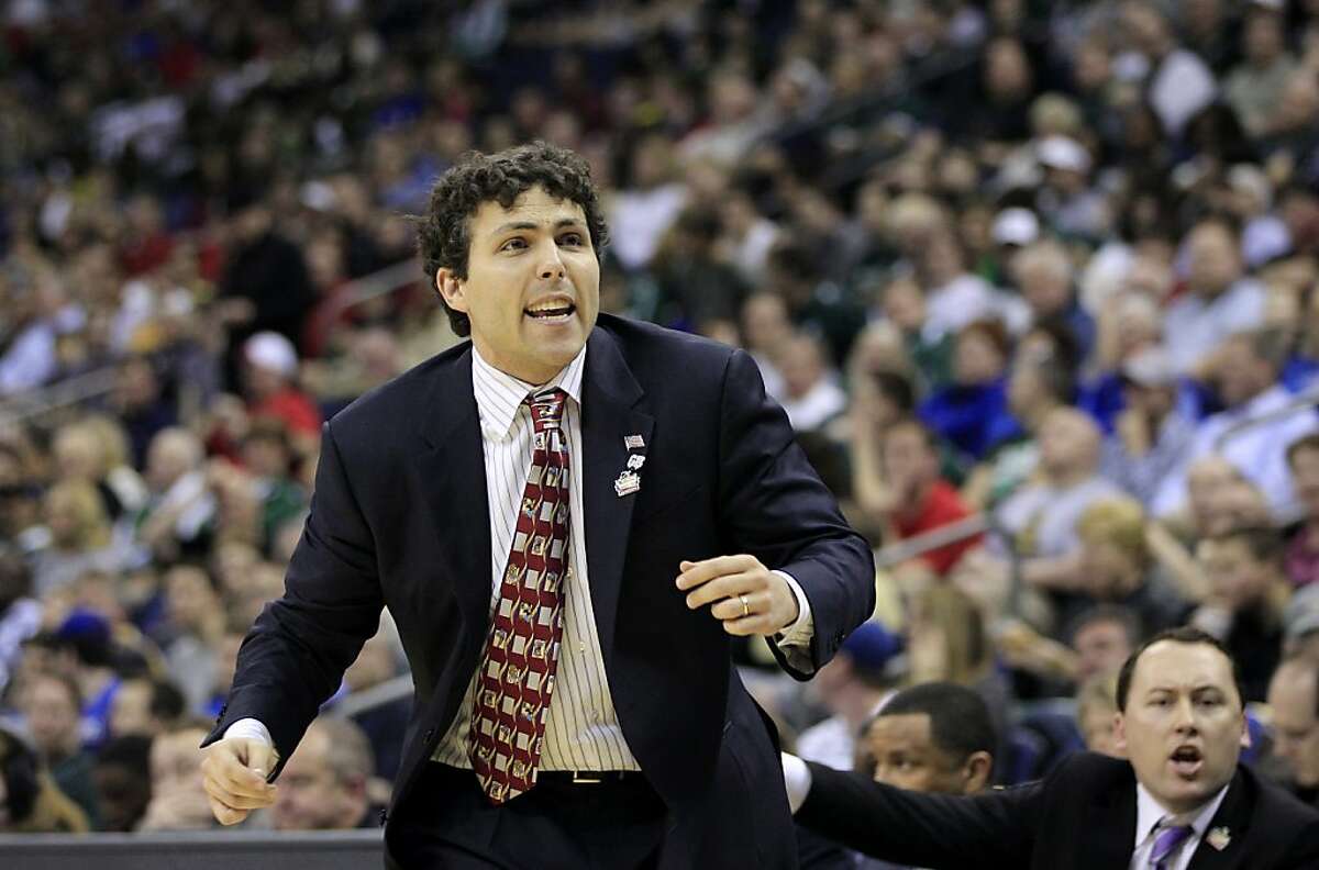 Memphis head coach Josh Pastner reacts during the first half of an NCAA men's college basketball tournament second-round game against Saint Louis in Columbus, Ohio, Friday, March 16, 2012. (AP Photo/Tony Dejak)