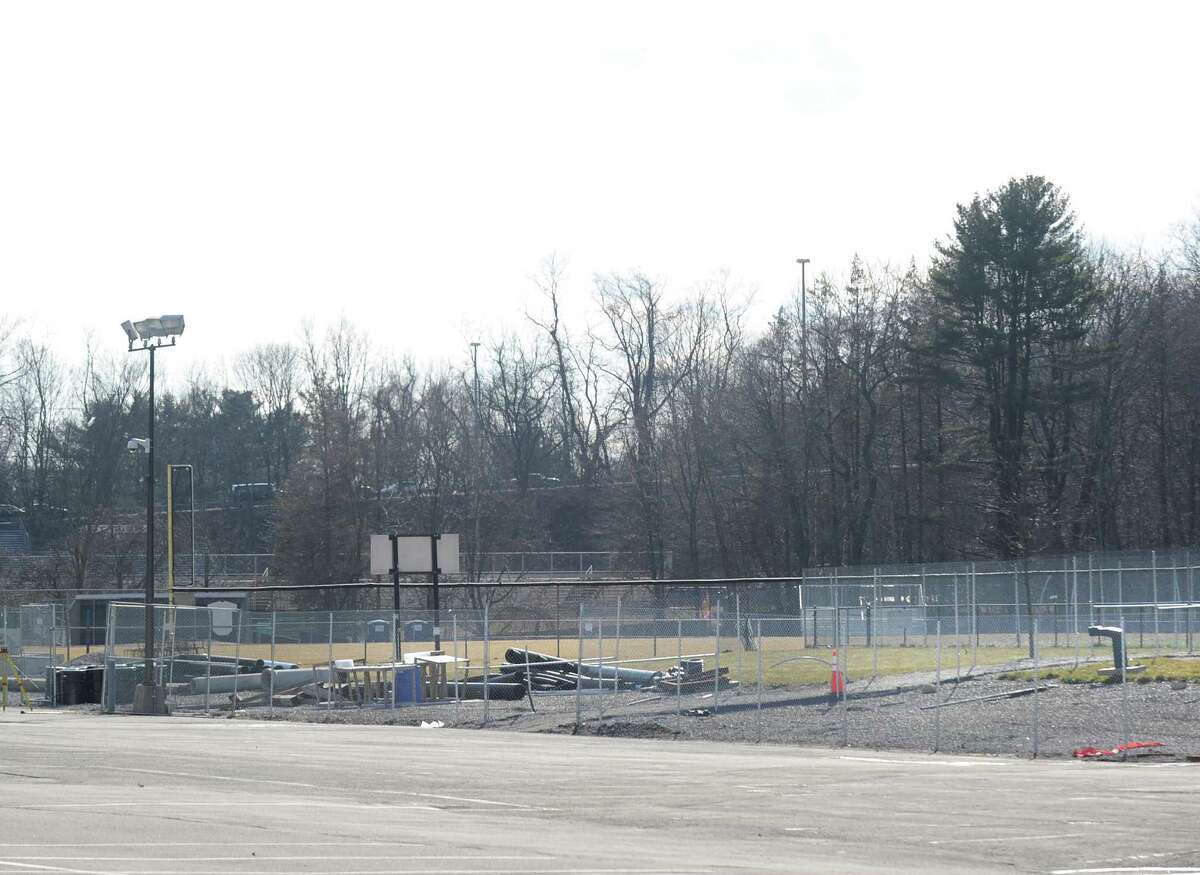A view of the parking lot and western athletic fields at Greenwich High School. In the latest findings released Friday, April 20, 2012, toxic substances have been found in groundwater in a well located between one of the fields at the center of the property and the back parking lot. This is a spot where the highest PCB levels were also found in the soil. Samples came from 10 wells installed at the school in December and February.