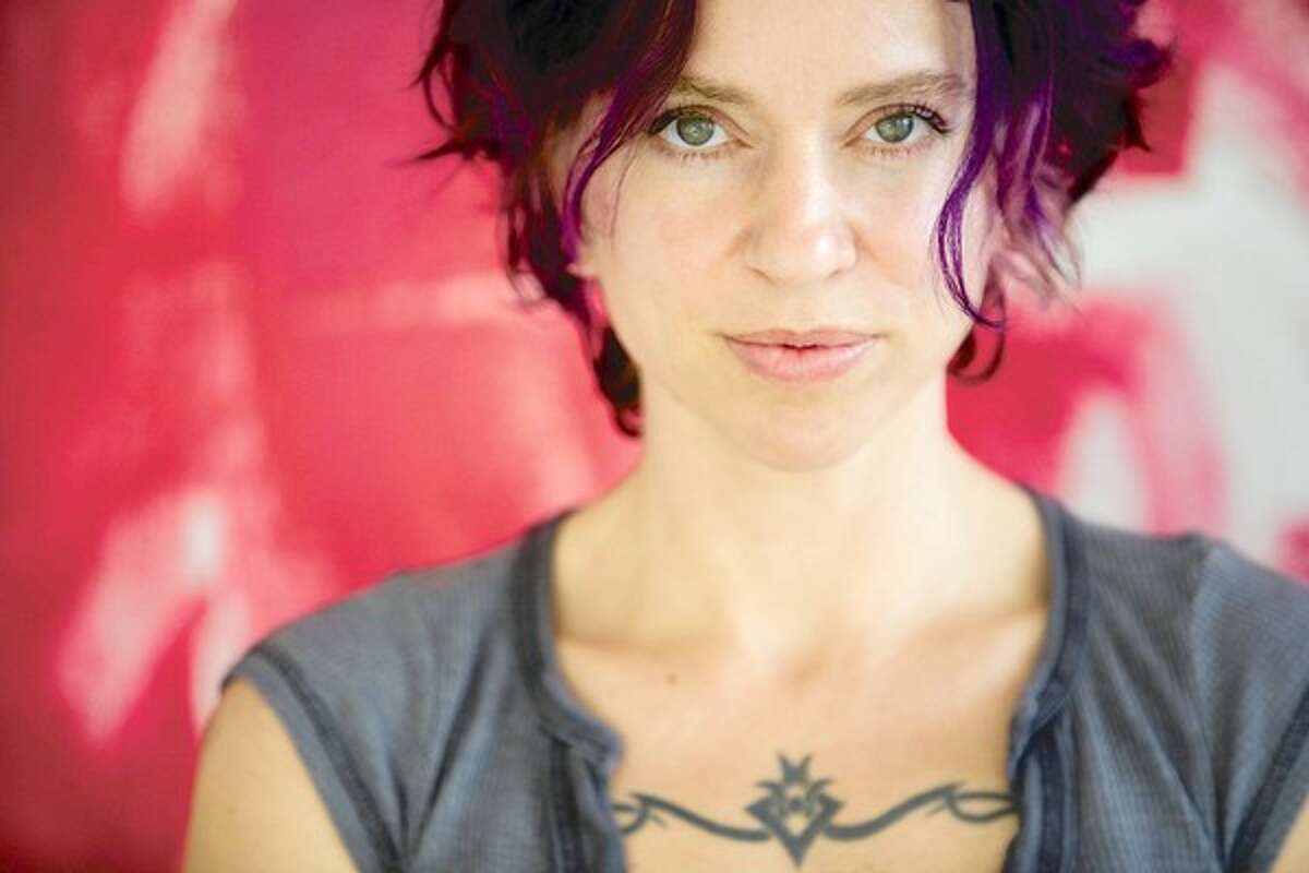 DiFranco melds old, new, power and charm