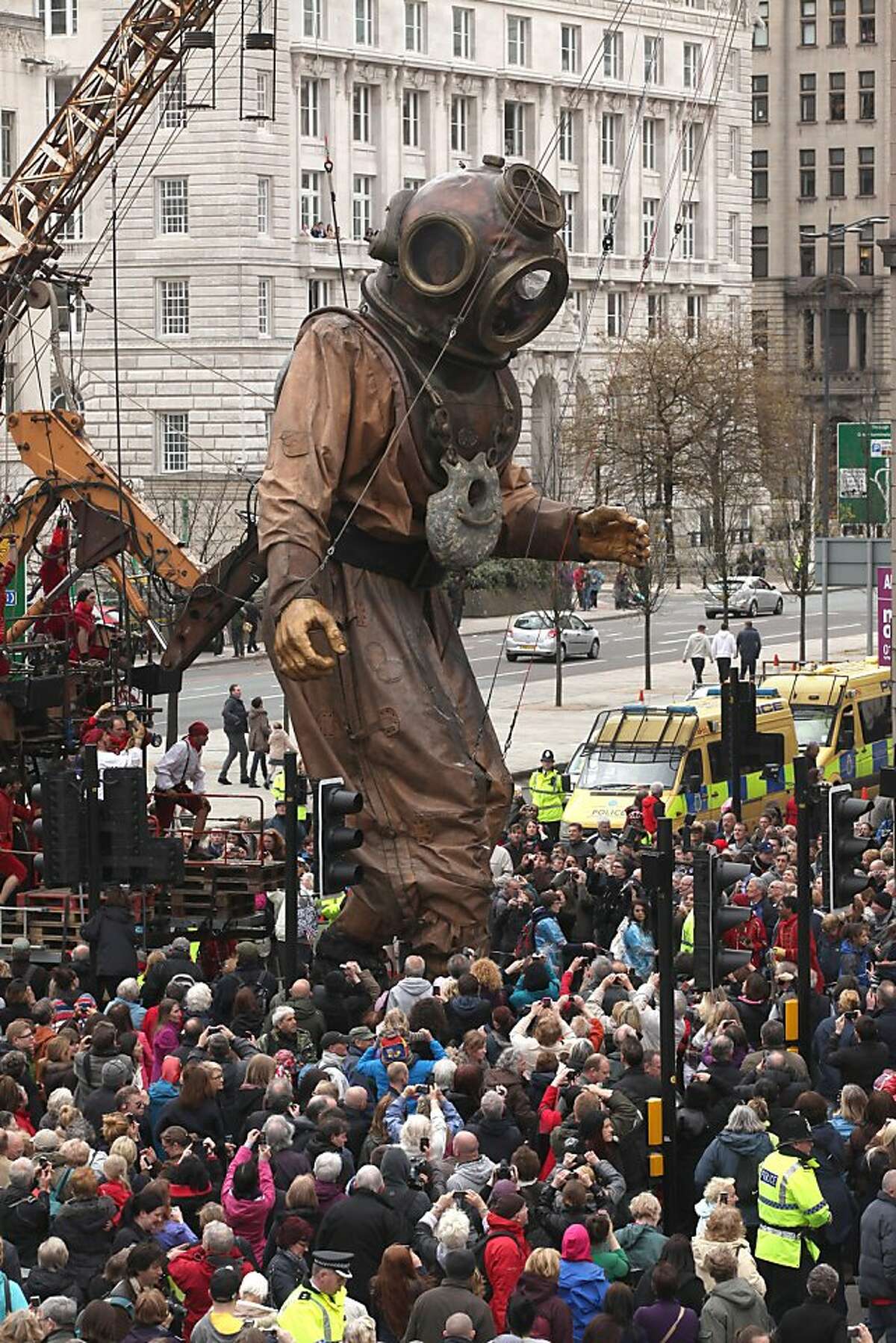 Giant puppets roam streets of Liverpool