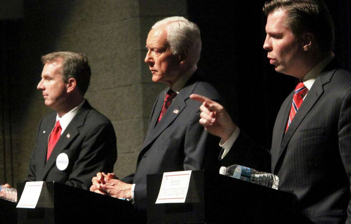 FILE - In this April 4, 2012, file photo, Sen. Orrin Hatch, center, faces off with Republican candidates for U.S. Senate Chris Herrod, left, and and Dan Liljenquist, during a debate sponsored by the Utah League of Women Voters in Salt Lake City. Hatch and his two key challengers, former state Sen. Liljenquist and state Rep. Herrod, have been appearing every day, several times a day, at restaurants, in backyards and at school libraries with mere handfuls of people, trying to secure votes one delegate at a time.(AP Photo/The Salt Lake Tribune, Rick Egan, File) DESERET NEWS OUT; LOCAL TV OUT; MAGS OUT