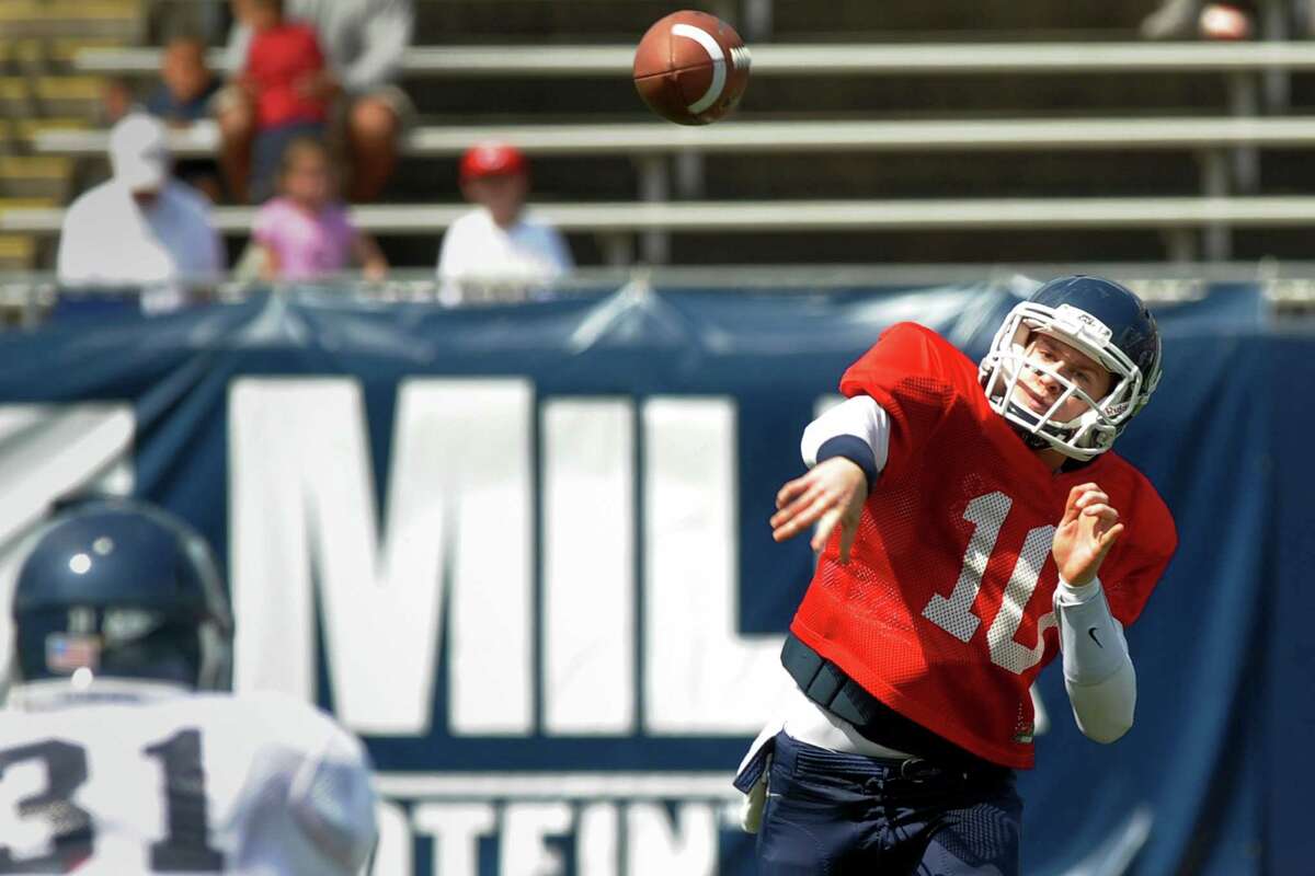 Connecticut quarterback Chandler Whitmer throws a pass during the second quarter of their spring NCAA college football game, Saturday, April 21, 2012, in East Hartford, Conn. (AP Photo/The Day, Tim Cook) MANDATORY CREDIT; MAGS OUT
