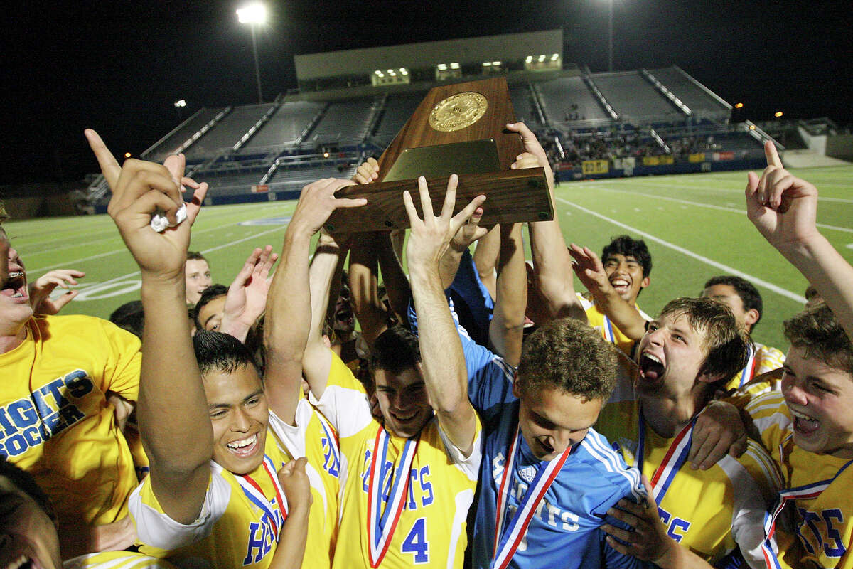 Members of the Alamo Heights Mules soccer team celebrate their 3-2 shootout win over the Wichita Falls Rider Raiders in the Class 4A state final game Saturday, April 21, 2012 at Birkelbach Field in Georgetown.