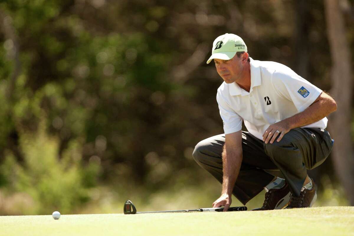 Matt Kuchar lines up a putt during the final round of the Valero Texas Open at the AT&T Oaks Course at TPC San Antonio on April 22, 2012 in San Antonio, Texas.