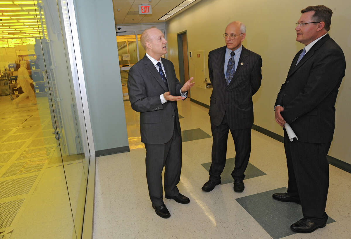From left, Michael Fancher, CNSE Vice President for Business Development and Economic Outreach; Director, New York State Center for Advanced Technology in Nanomaterials and Nanoelectronics (CATN2); Associate Professor of Nanoeconomics, Congressman Paul Tonko and Mike Molnar, of NIST, tour the tour CNSE's Albany NanoTech Complex Monday April 23, 2012 in Albany, N.Y. (Lori Van Buren / Times Union)