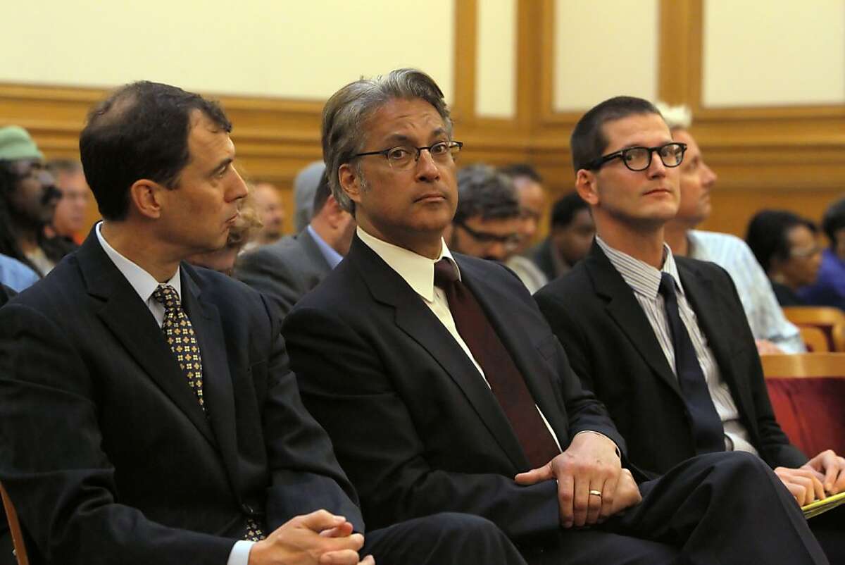 Sheriff Ross Mirkarimi, center, is flanked by his attorneys, Shepard Kopp, left, and David Waggoner, right, as the San Francisco Ethics Commission began discussing the procedures it will follow for the sheriff's official misconduct hearing on Monday, April 23, 2012, in San Francisco, Calif.